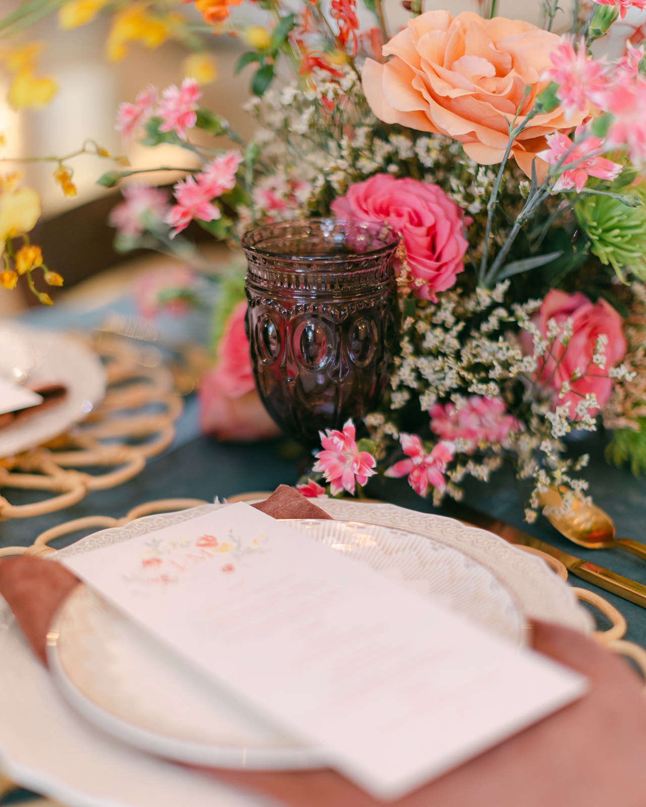 watercolor menu on a bright floral table from Cotton and Bow paper company