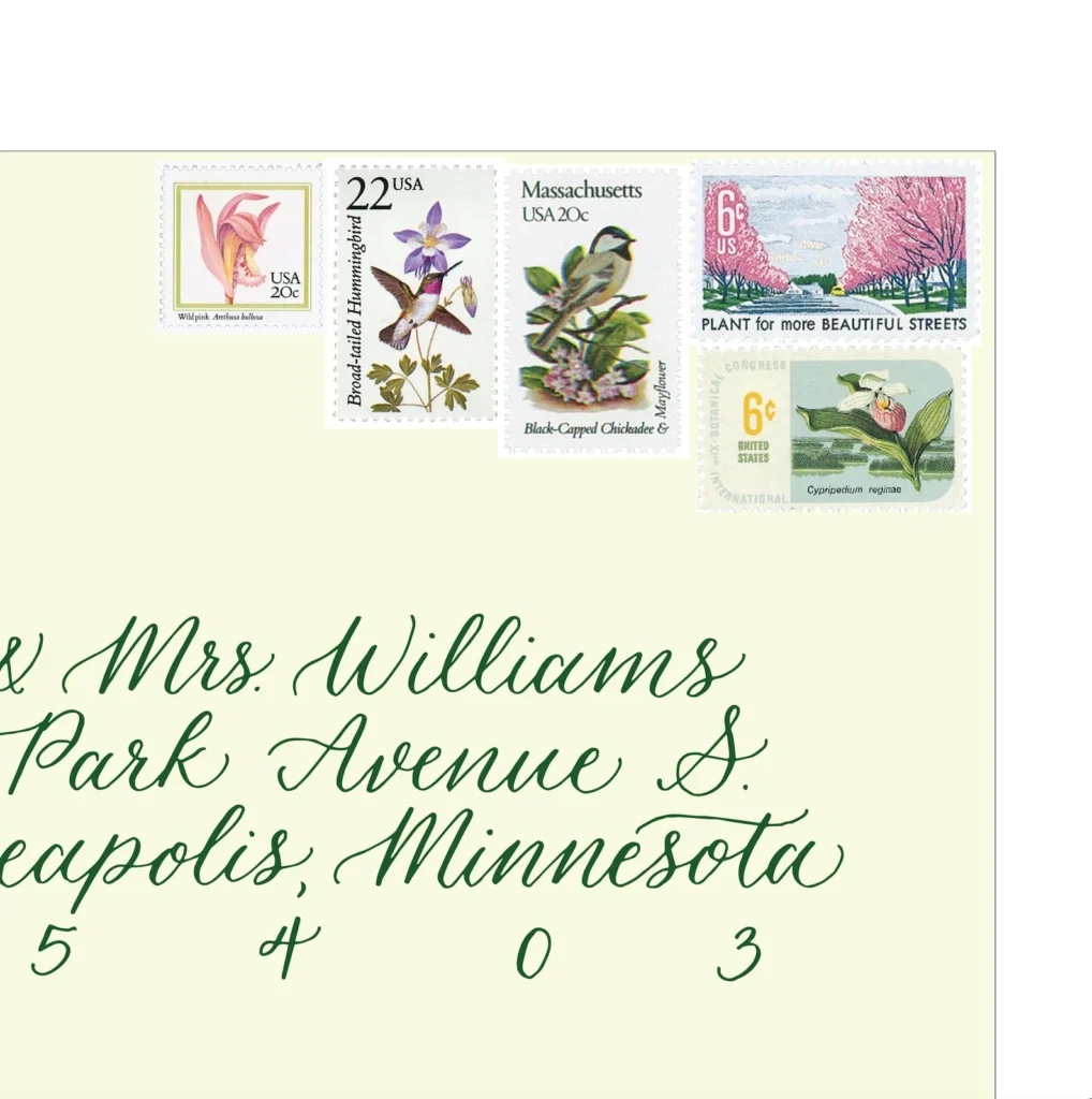 photo of a curated vintage stamp set featuring birds and flowers of spring time